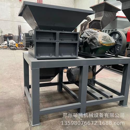 双轴多功能大蓝桶撕碎机 一机多用的金属制品与轻薄料撕碎解决方案